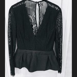 Plunging black lace peplum top
